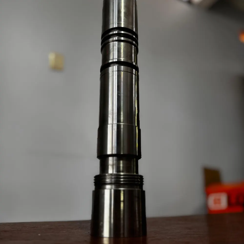 Eje escalonado con alojamientos para sellos, mecanizado en CNC para aplicacion petrolera